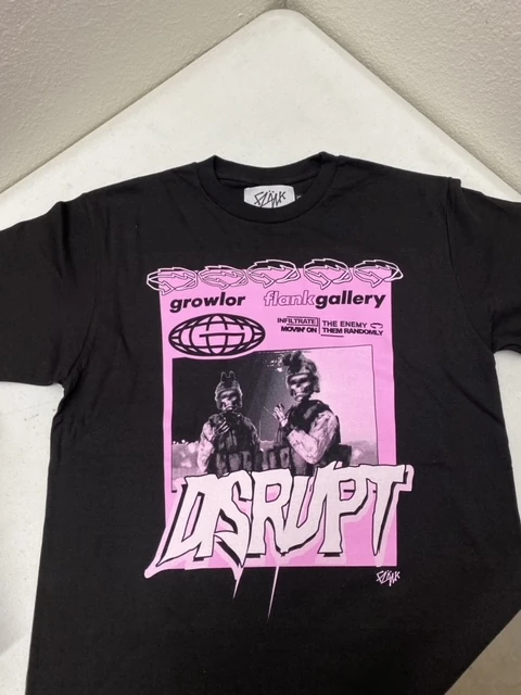 Black T-shirt with a vivid pink graphic, printed by Grizzly Graphics